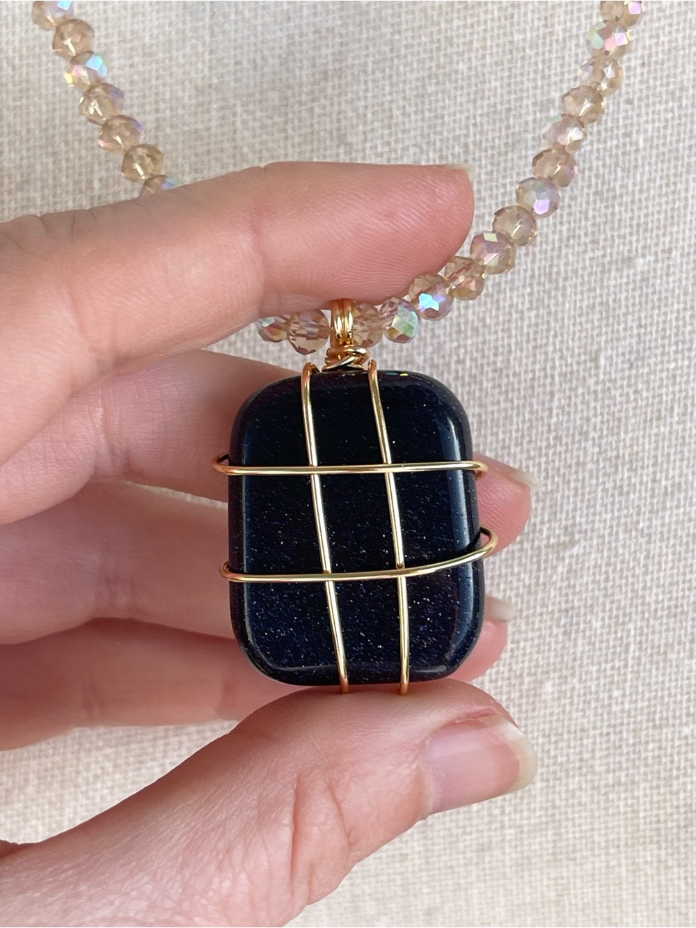 Navy Blue Gold Stone Necklace Gold Tone Wire Wrapping and Champagne Glass Beads